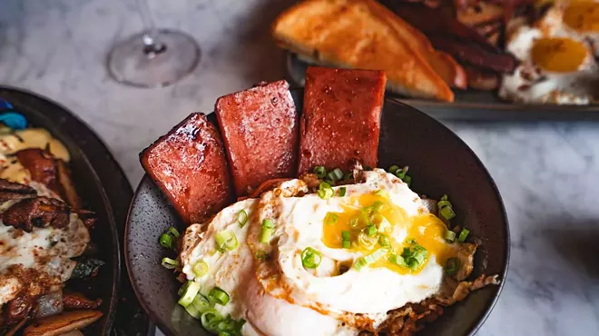 Tigerlily’s new weekend brunch menu includes a Pacific islands twist on breakfast favorites, like Eggs Benedict served over a bao bun with spam.