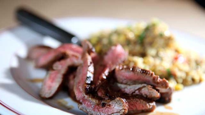 Chile-rubbed flank steak with grilled corn and quinoa salad from Vinsetta Garage in Royal Oak.