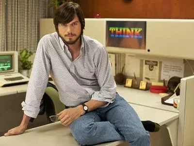 Ashton Kutcher plays a mogul in mom jeans in Jobs.