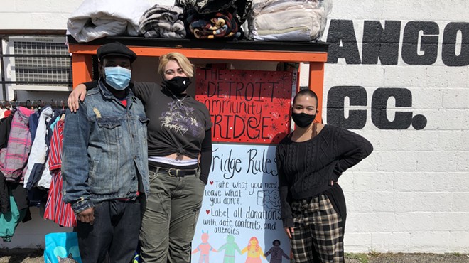 Ryan Yeargin (left) of the east side business Hats Galore & More partnered with Kazza Kitchell (center) and Alyssa Rogers (right) of Detroit Community Fridge, a mutual aid organization that's setting up free refrigerators and pantries in the city.