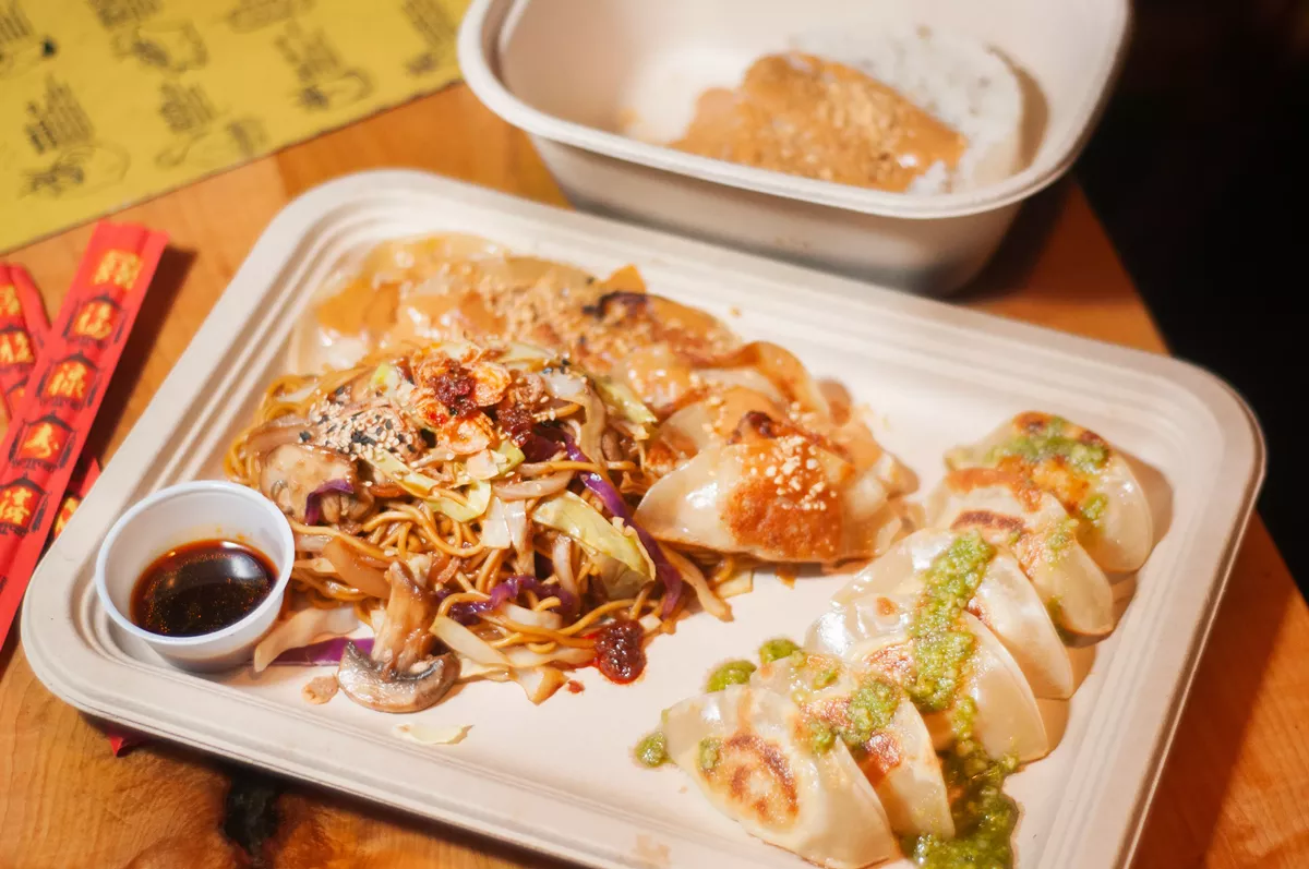 Image: Yakisoba noodle, Cocomama gyoza, Goat Daddi gyoza, and Coconut rice.