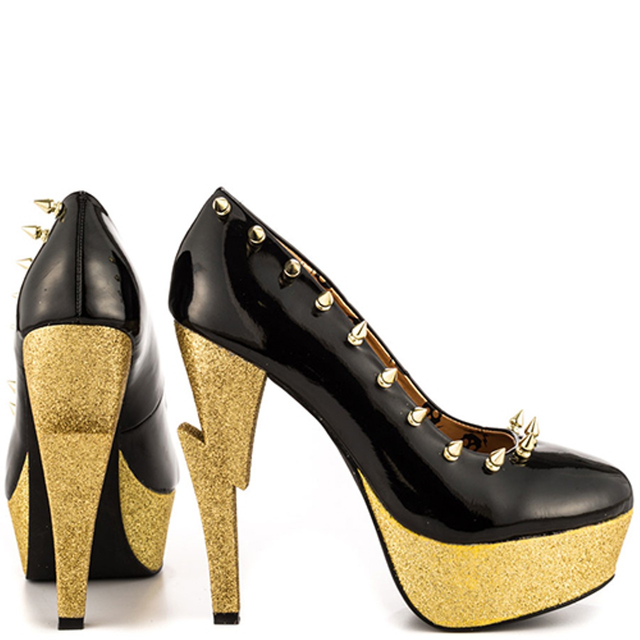 GOLD BOLT HEELS ..........
Lightening bolt shaped heel in gold glitter. Shiny black upper with gold spikes along outer side and across the front toe. 5 1/2 inch heel and 1 1/2 inch platform. You wanna inflict some pain? Step on his back with these puppies!