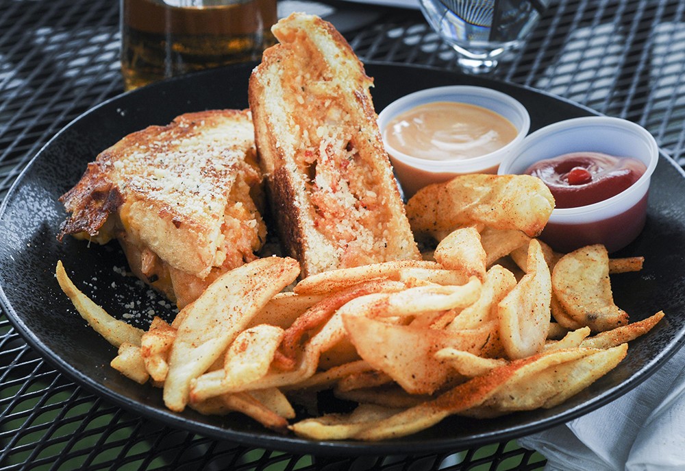 Good Times serves up a “modern” take American comfort food classics, like this shrimp and lobster grilled cheese.