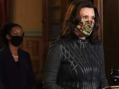 Dr. Joneigh Khaldun, the state’s chief medical executive, and Gov. Gretchen Whitmer at a recent news conference.