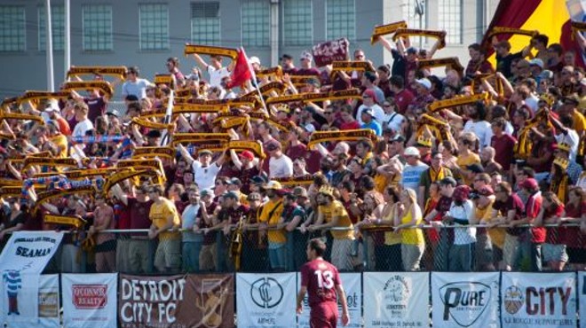 The Detroit City FC playing on its home turf, Cass Tech High School.