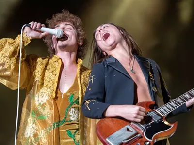 Brothers Joshua Kiszka and Jake Kiszka of Greta Van Fleet perform in 2022.