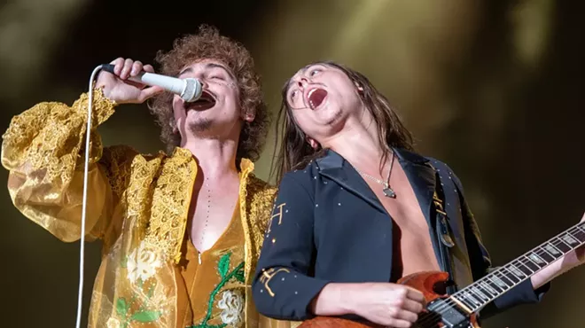 Brothers Joshua Kiszka and Jake Kiszka of Greta Van Fleet perform in 2022.