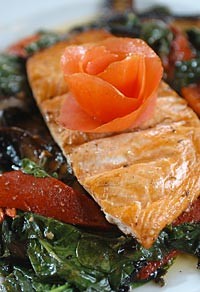 Grilled fresh fillet of salmon served over a bed of portabello mushrooms, spinach and roasted red peppers, topped off with balsamic vinegar, from Phoenicia in Birmingham. - Metro Times photo/Rob Widdis