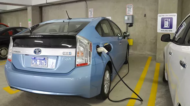 A car being charged at one of the 18 electric vehicle chargers in Ann Arbor.