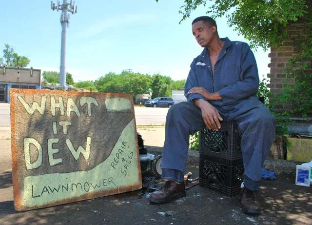 Gus Mills in his parking lot, waiting for customers