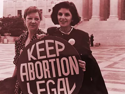 Norma McCorvey (Jane Roe) and her lawyer Gloria Allred on the steps of the Supreme Court, 1989.