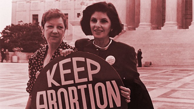 Norma McCorvey (Jane Roe) and her lawyer Gloria Allred on the steps of the Supreme Court, 1989.