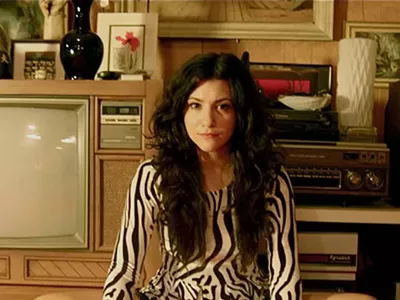 Alex Winston isn't singing opera these days.