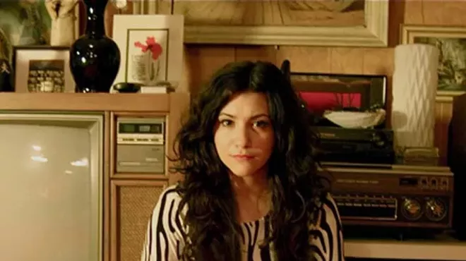 Alex Winston isn't singing opera these days.
