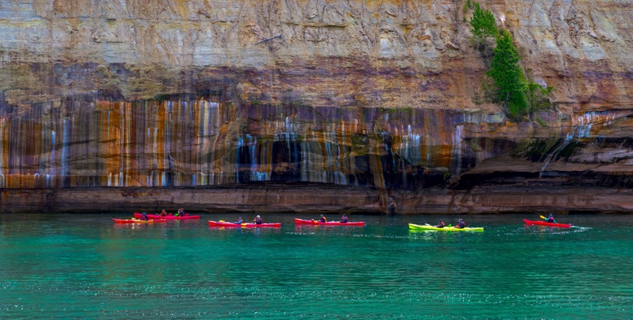 Pictured Rocks National Lakeshore
Pictured Rocks has so many hiking trails it’s hard to choose one. It’s a great place for backpacking or just lounging in a hammock and taking in the views of Lake Superior. You can also cruise around on a guided boat tour of the rock formations so you don’t have to do anything but sit back and relax. If you go that route, make sure to bring snacks as tours typically last a few hours.