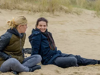 When Marianne (Juliette Binoche) bonds with Chrystèle (Hélène Lambert), Chrystèle doesn’t know her new friend is a journalist seeking information.