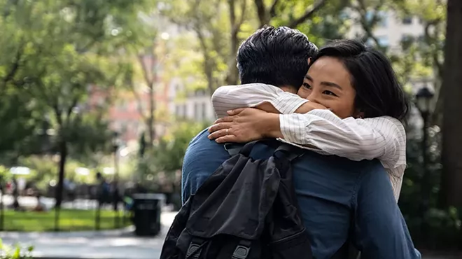 Nora (Greta Lee) embraces childhood sweetheart Hae Sung (Teo Yoo).