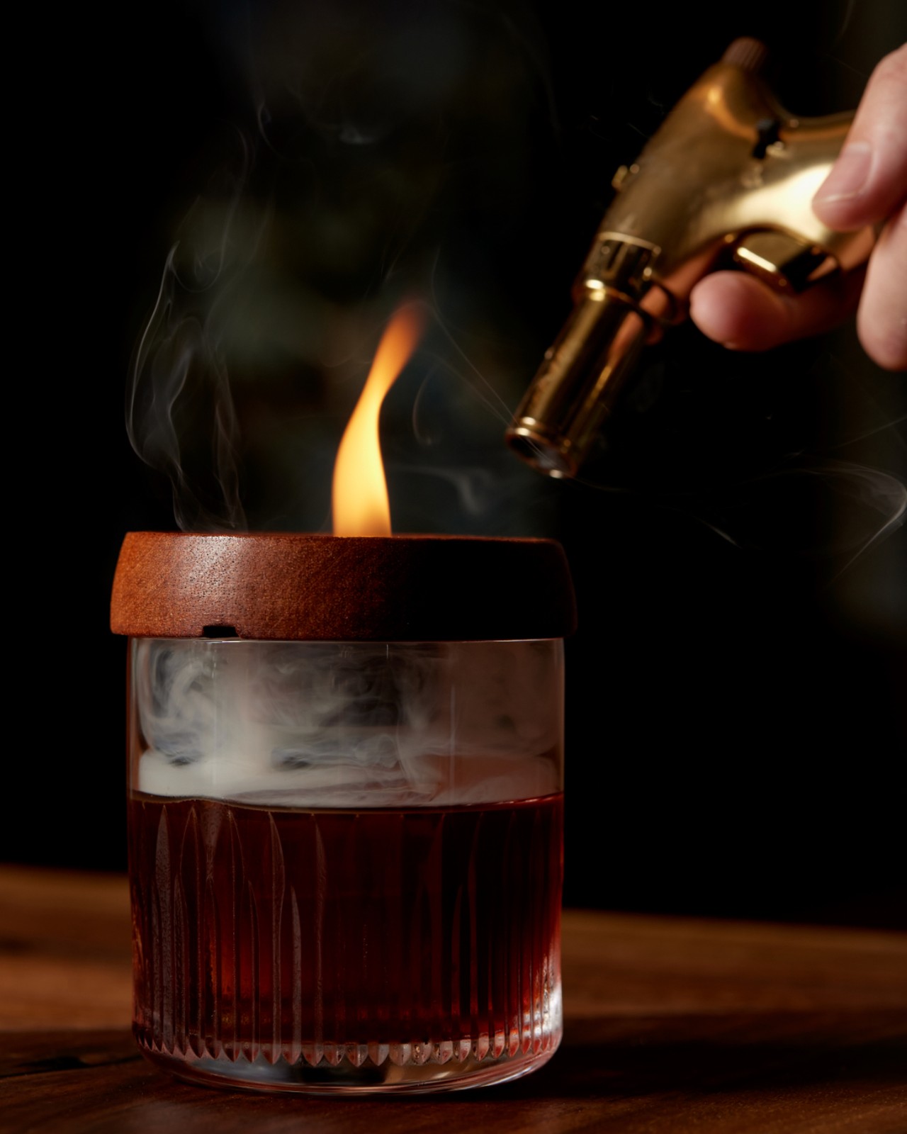 Dreams & Reflections — roku gin, vermouth, Campari, coffee liqueur, and cherry wood smoke.