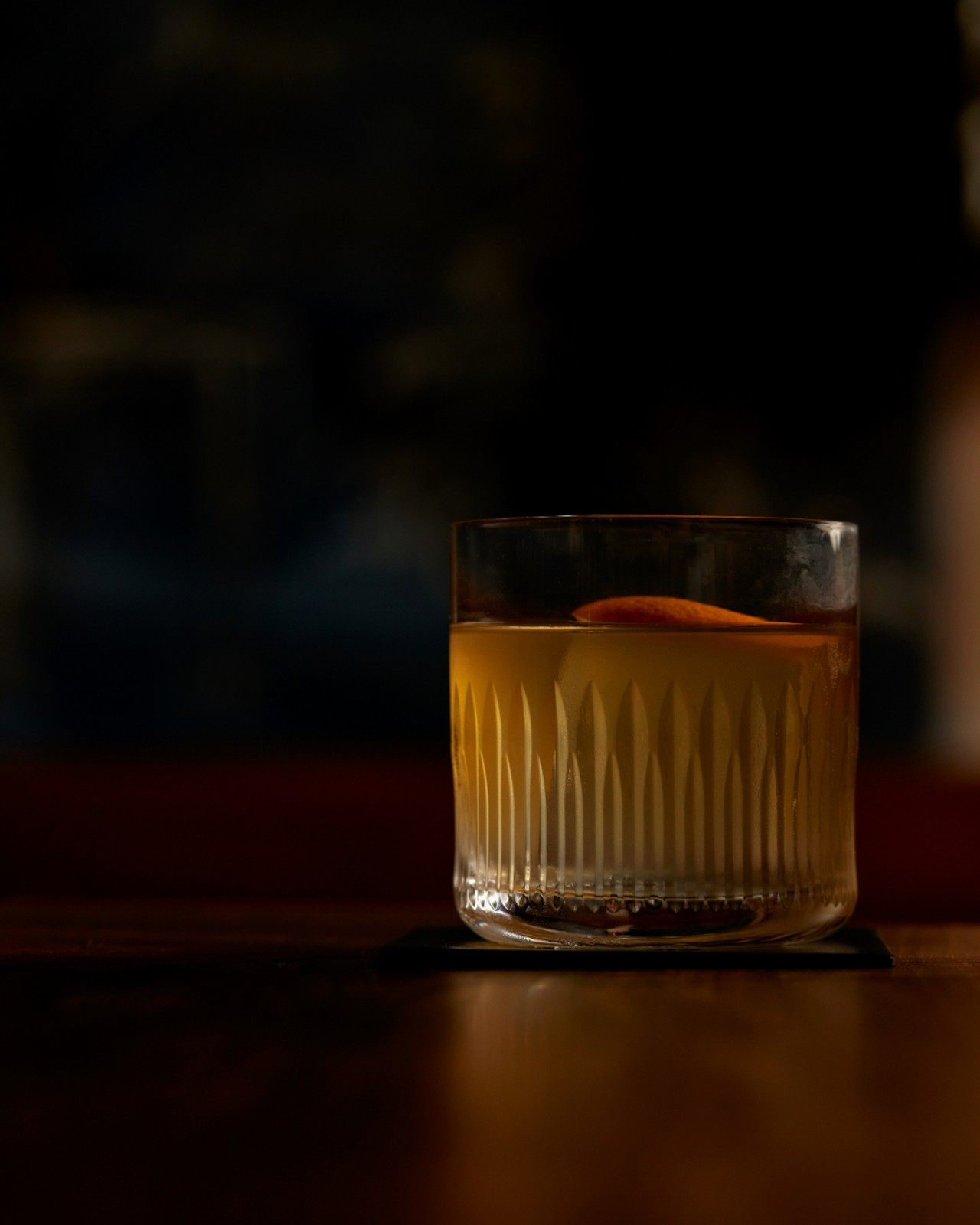 Show Me You're Real — toki whiskey, cognac, miso, pecan, and orange bitters.