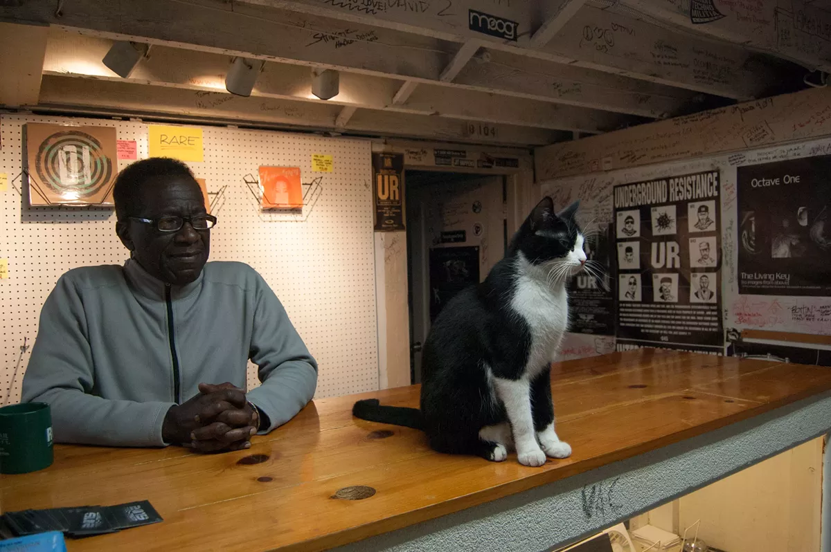 John Collins, left, and DJ Alley Cat mind UR’s record store.