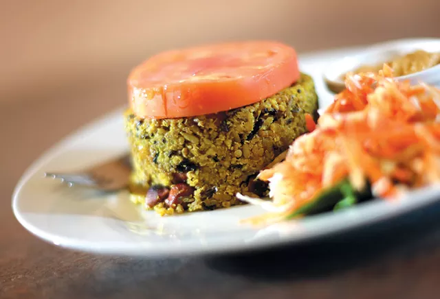 Katie's Surprise: amaranth, quinoa, millet, wild rice, brown rice, seasoned with green mango, nuts, herbs, spices, with red chutney.