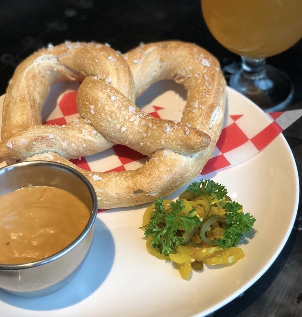 Livernois Tap
567 Livernois Ave, Ferndale, MI 48220
With pigs in a blanket, steak fries, pretzels, and donut holes, Livernois Tap has enough finger food to keep both you and your kids satisfied.
Photo courtesy of @axlebrewingco</a