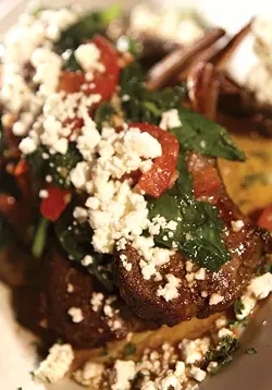 Lamb chops with sauteed spinach, tomatoes, garlic & feta cheese. - MT Photo: Rob Widdis