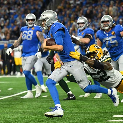 The Detroit Lions’ Jared Goff gets tackled by the Green Bay Packers’ Rashan Gary.