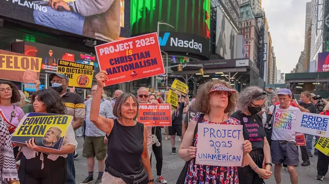 Demonstrators rally against Project 2025 in Manhattan’s Times Square.