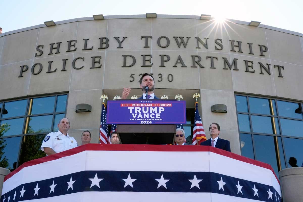 Republican vice presidential nominee Sen. JD Vance speaks at a campaign event at Shelby Township Police Department, Wednesday, Aug. 7, 2024.