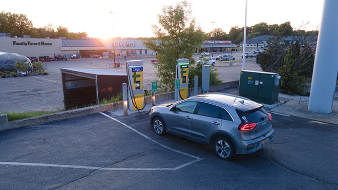 An electric car charging at a ChargePoint DC fast charger in Clare, Michigan.