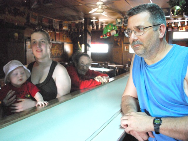 The Dyer family inside their bar.