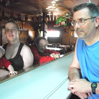 The Dyer family inside their bar.