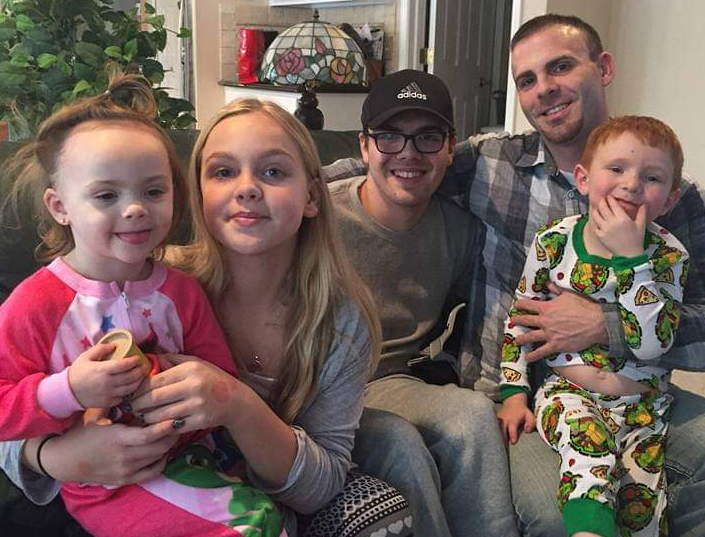 Salvatore “Sal” Cipolloni (right) with his four children.