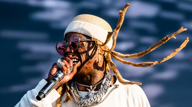 Lil' Wayne performs at Lollapalooza in Grant Park, Chicago.