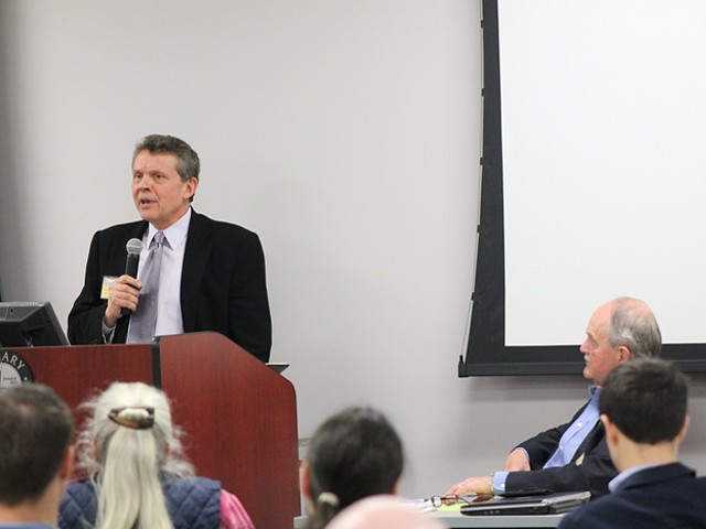 Rich Robinson, Executive Director of the Michigan Campaign Finance Network speaks at the Michigan Election Reform Conference at Cleary University in Ann Arbor last week.