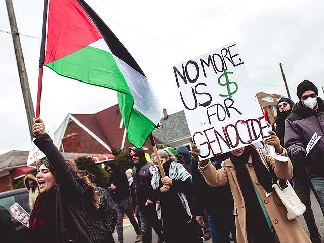 Protesters call for an end to Israel’s attacks on Gaza at a Detroit-area rally.