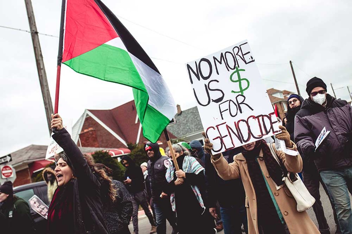 Protesters call for an end to Israel’s attacks on Gaza at a Detroit-area rally.