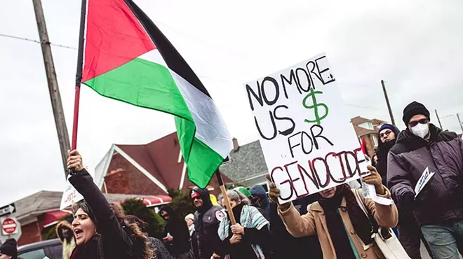 Protesters call for an end to Israel’s attacks on Gaza at a Detroit-area rally.