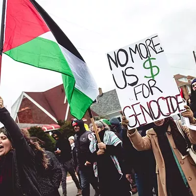 Protesters call for an end to Israel’s attacks on Gaza at a Detroit-area rally.