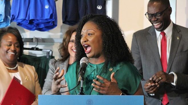 Sen. Sarah Anthony speaks at the signing of the CROWN Act at Moneyball Sportswear in Lansing, Michigan on June 15, 2023.