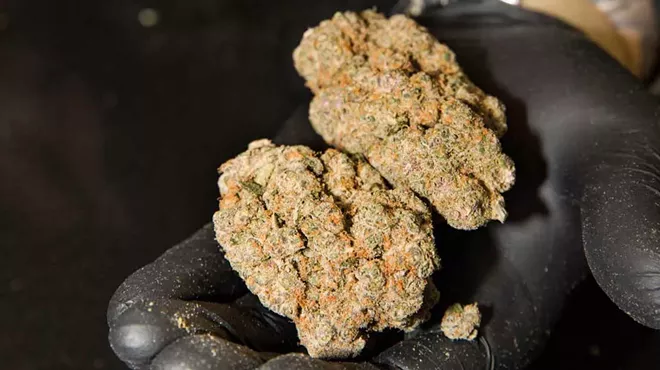 Image: Michigan communities are raking in benefits of legalized weed