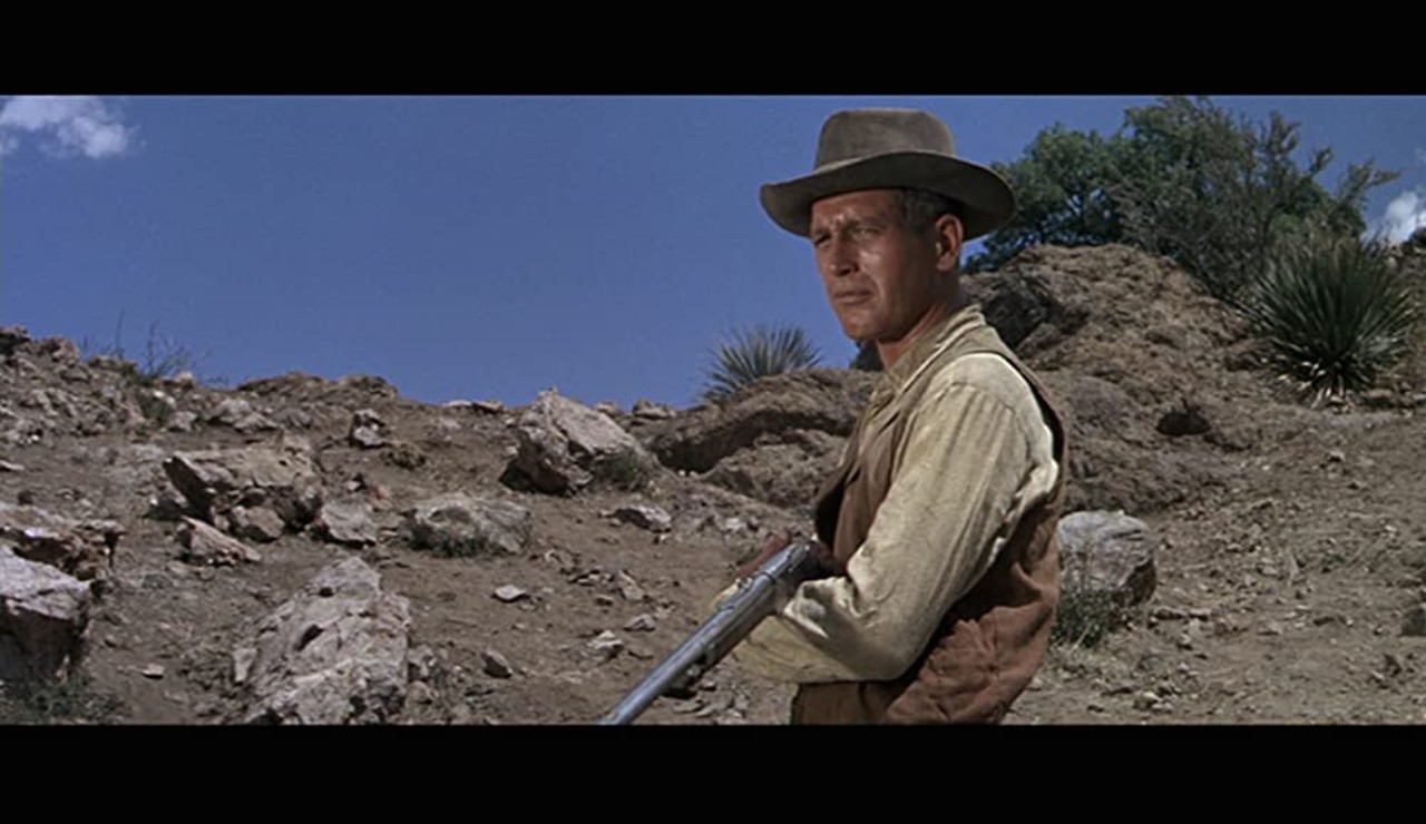 Hombre (1967)
Directed by Martin Ritt. Written by Irving Ravetch and Harriet Frank Jr. Produced by Martin Ritt and Irving Ravetch.
Based on the fifth and final novel of Leonard’s early Western phase, published in 1961, the film stars Paul Newman as John Russell, a white man raised by Indigenous American who experiences racism because of his background. It received generally favorable reviews, thanks to portraying Indigenous Americans in a more positive light than typically seen in Westerns.