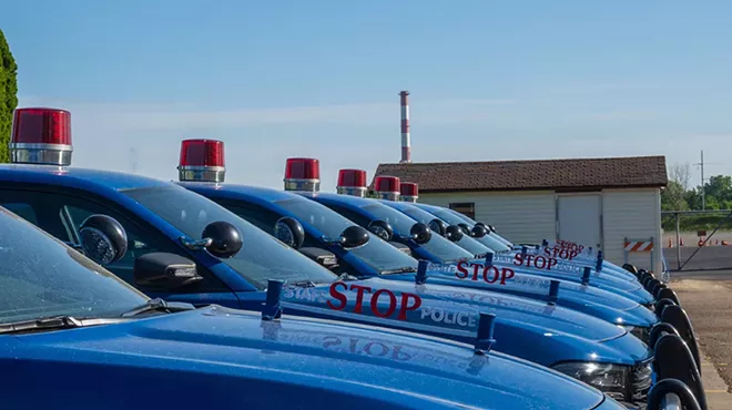 A fleet of Michigan State Police vehicles.