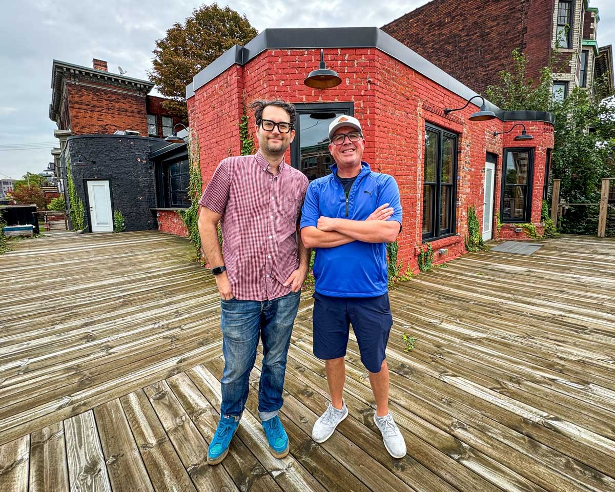 Business partners Sandy Levine (left) and Doug Hewitt (right) on the patio of their forthcoming Midtown bar, Dirty Shake.