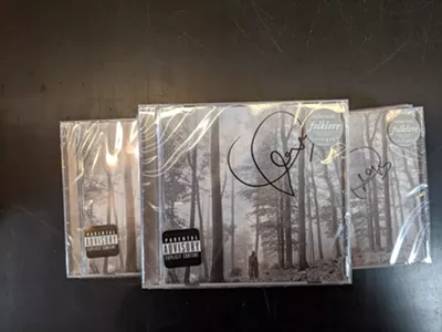 Image: Taylor Swift sent 'quite a few' signed copies of 'folklore' to Dearborn Music because she ain't no snake