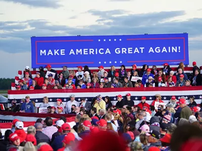 Image: Michigan Democrats blast Trump for hosting 'superspreader' rally in Muskegon