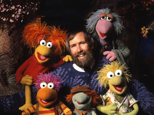 Jim Henson with puppets from Fraggle Rock.