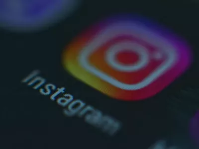 A photo of a monitor or a tablet or phone screen with the Instagram icon.