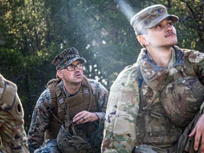 U.S. Marine Corps Lance Cpl. Samuel Bacchi, a motor transport operator with Combat Logistics Battalion 23, receives instructions during Northern Strike 23 at Camp Grayling in August 2023.